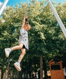 Girl hanging from yoyo