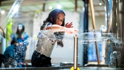Girl plays with water
