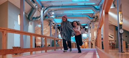 two-girls-running-indoors