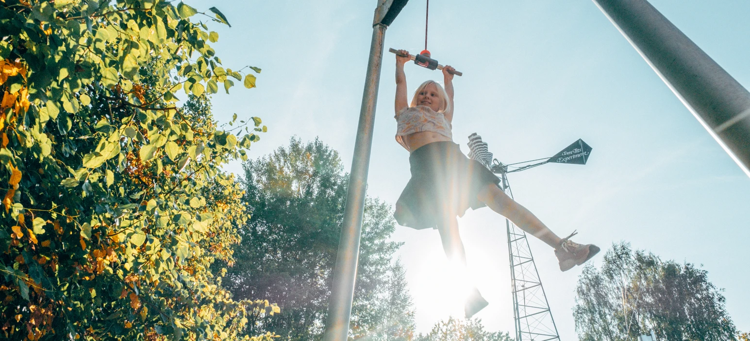 A person on a high jump in the air.