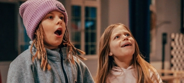 Two girls surprised