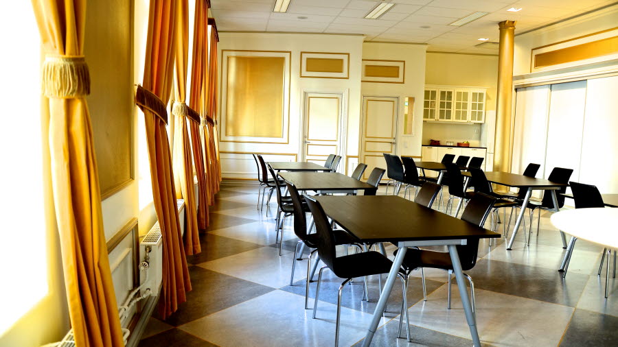 Tables and chairs in the conference room The gold room