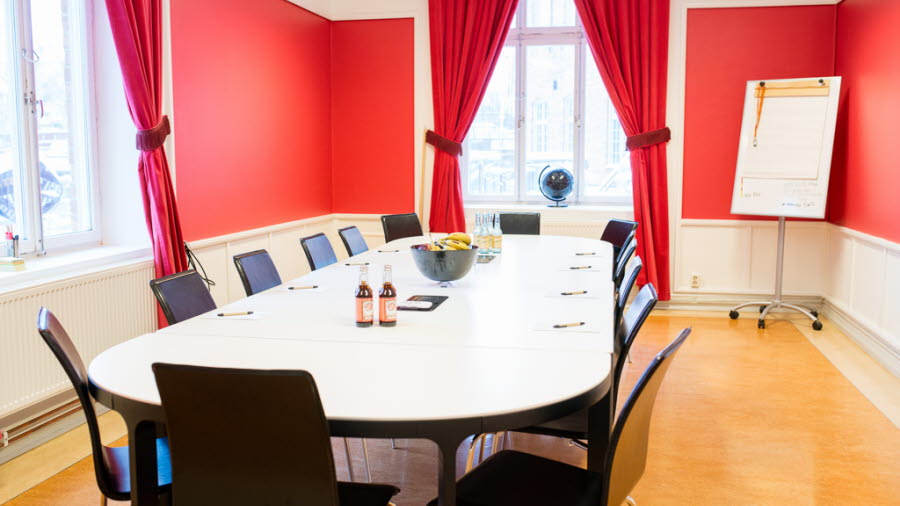 Tables and chairs in the conference room The red room